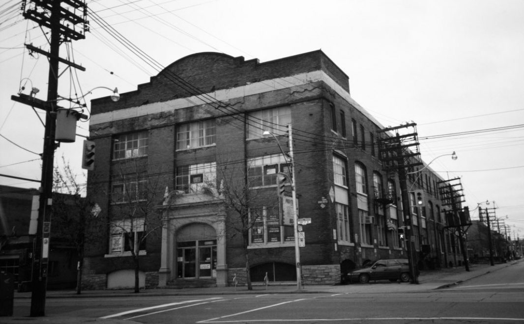 A historical photograph of Vela's building at King & Portland in Toronto.